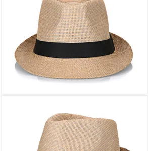 Close-up macro view showing the breathable weave texture of a straw fedora hat.
