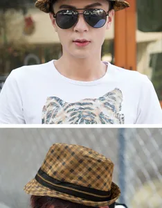 Detail view of stylish yellow plaid fedora hat with decorative zipper accent for men and women