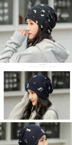 Fashionable Asian model wearing a cat print slouchy beanie hat for cold winter days