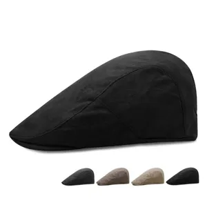 Minimalist suede flat cap for men and women, warm winter ivy hat in black.