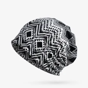 Close-up of women's slouchy beanie featuring a black and white geometric zigzag pattern