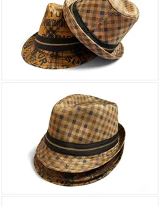 Detail view of vintage brown fedora hats with graffiti print and gold zipper bands