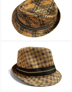 Detail view of plaid fedora hat with graffiti print and gold zipper band detail