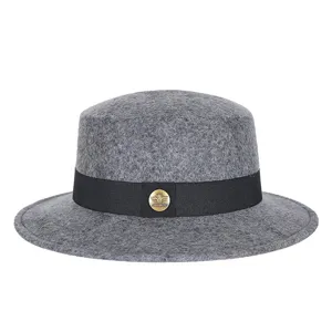 Elegant grey wool flat top boater hat featuring a black ribbon and gold metal badge