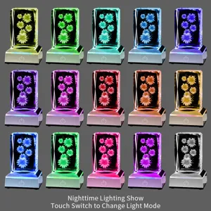 Detail of 3D laser engraved daisy crystal night light showing multiple color modes