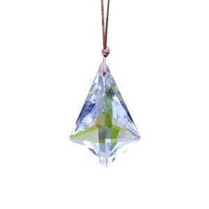 Detailed view of the clear K9 crystal faceted prism pendant hanging sun catcher ornament.