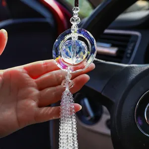Crystal car hanging ornament with sparkling multi-cut facets and bead tassels for auto decor.