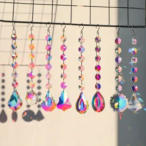 Detail view of crystal suncatchers with various prism shapes creating rainbow light