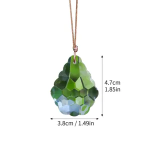 Green faceted K9 crystal suncatcher prism pendant with dimensions 4.7cm by 3.8cm