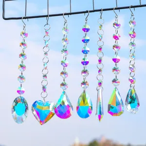Collection of iridescent crystal suncatcher pendants in various shapes for rainbow makers.