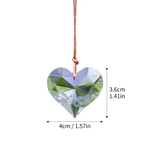 Close-up of heart-shaped K9 crystal suncatcher showing 4cm x 3.6cm product size