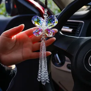 Macro detail shot of a colorful sparkling crystal butterfly car hanging pendant ornament