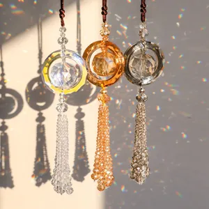 Crystal car hanging ornament detail showing sparkling faceted spheres with stunning rainbow light.