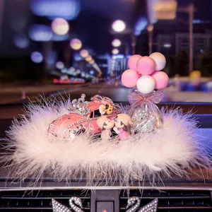 Car dashboard decoration ornament rhinestone vintage car perfume holder with cute couple and pink fluff.
