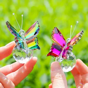 Detailed view of colorful crystal butterfly figurines with faceted base ornaments.