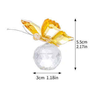 Detailed dimensions of yellow crystal butterfly figurine on a faceted glass ball base