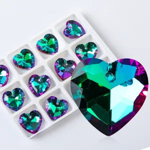 Macro view of iridescent heart-shaped faceted crystal pendants for DIY jewelry making