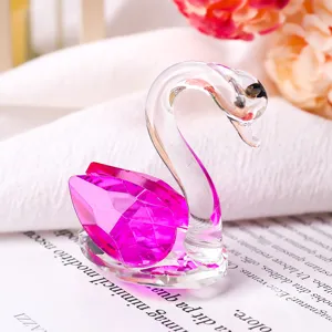 Close-up of elegant pink faceted crystal swan figurine for wedding and home decor gift