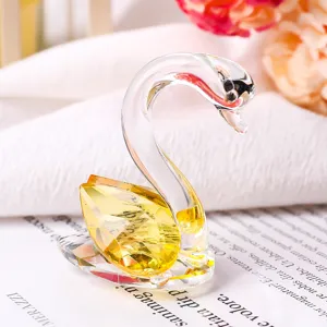 Detailed macro shot of a yellow faceted crystal swan figurine for elegant home decor