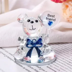 Exquisite macro shot of crystal bear figurine holding heart with Best Friend engraving