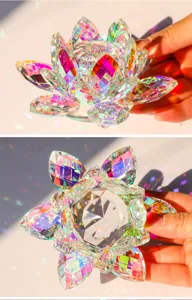 Close-up detail of the faceted crystal lotus ornament showing stunning colorful light refraction.
