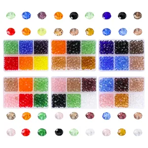 Assorted faceted crystal glass beads organized in 6-grid boxes for DIY jewelry making.