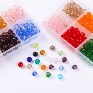 Detailed view of multi-colored faceted crystal beads in 6-compartment storage box