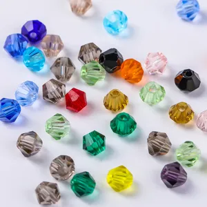 High-resolution detail of colorful 4mm faceted bicone crystal beads for DIY jewelry crafts