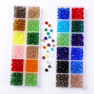 Assorted faceted crystal glass beads set in transparent storage organizers for DIY jewelry