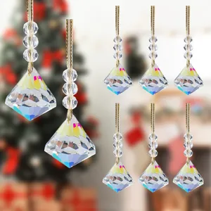 Set of 8 faceted crystal diamond Christmas ornaments with gold strings for tree decor.