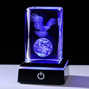 Detailed close-up of 3D laser engraved crystal cube night light featuring eagle and globe