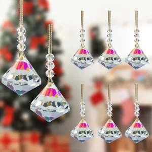 Set of sparkling diamond-shaped crystal Christmas tree pendants with colorful refraction.