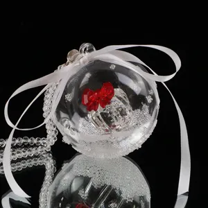 Elegant crystal car hanging ball ornament featuring a red bow and white silk ribbon detail
