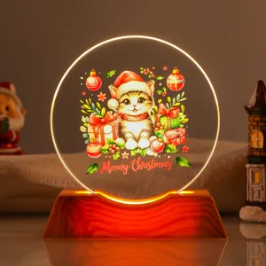 Warm glowing LED night light with cute Christmas kitten illustration and wooden base