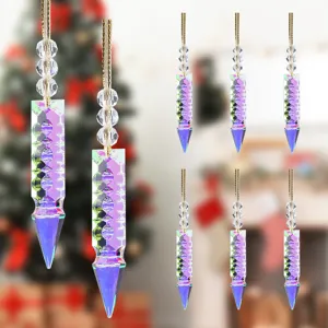 Set of iridescent crystal icicle Christmas tree ornaments in a festive room setting
