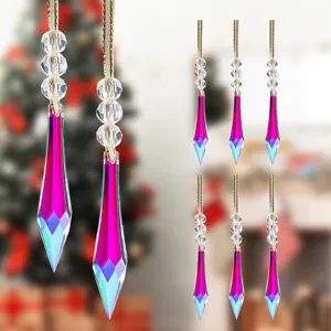 Detailed view of fuchsia and blue crystal icicle pendants for Christmas tree decoration