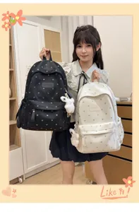 Stylish heart pattern school backpacks in black and white with cute plush rabbit charms