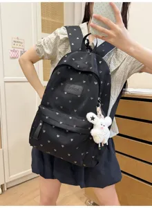 Detailed view of lightweight black heart print backpack for students and commuters