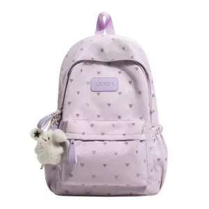 Lightweight lavender casual backpack with silver heart pattern and cute plush charm