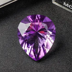 Large vibrant purple pear-shaped faceted crystal gemstone for craft and jewelry decor