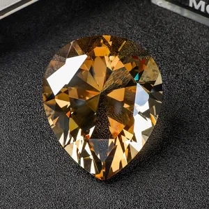 Stunning teardrop champagne colored crystal gemstone with high quality pear cut facets
