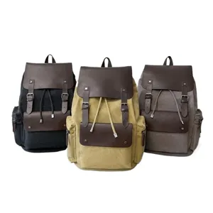 Juego de tres mochilas vintage de lona con cordón en caqui, negro y gris para viajes