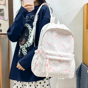 Mochila blanca linda estilo coreano con patrón de lazo rosa y flores para estudiantes