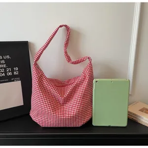 Red and white checkered tote bag shown with a tablet for size comparison