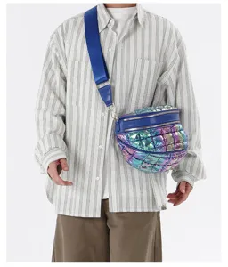 Detail view of iridescent quilted bubble crossbody bag shown on model in white studio