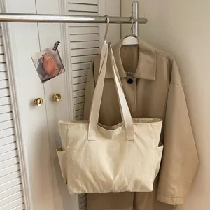 Minimalistische große beige Canvas-Tragetasche für Schule oder tägliches Pendeln