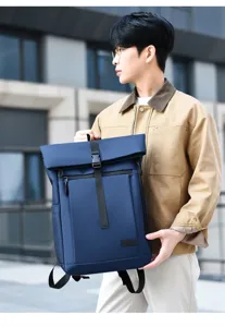 Men's stylish blue water-repellent backpack shown in a detailed urban lifestyle shot.