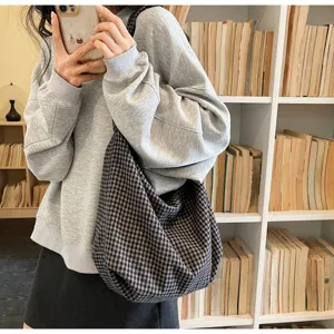 Literary style black and white checkered nylon tote bag for women in library setting