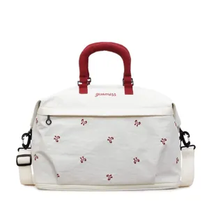 Stylish women's large capacity travel bag with red handles and bow embroidery