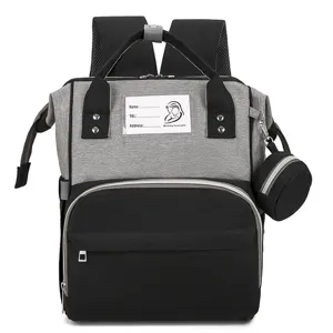 Multifunctionele Oxford luiertas rugzak in grijs en zwart met kleine ronde etui